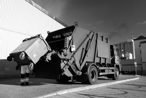 Satisfied builders utilizing skip hire services in Pinner