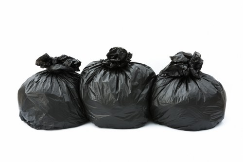 Professional muck away team preparing for waste removal in Pinner